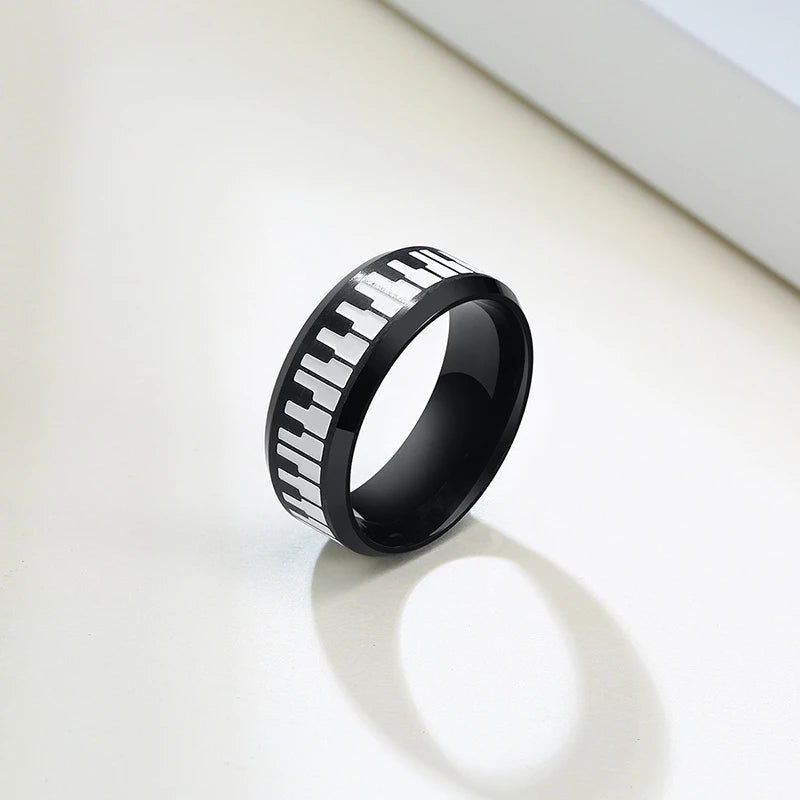 ANEL UNISEX PIANO EM AÇO INOXIDÁVEL