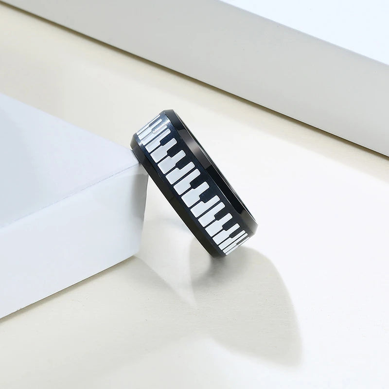 ANEL UNISEX PIANO EM AÇO INOXIDÁVEL