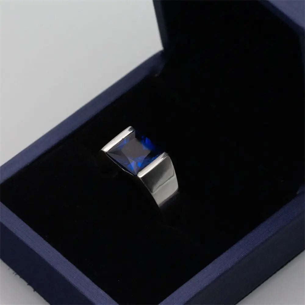 ANEL EM PRATA ESTERLINA 925 COM PEDRA AZUL NATURAL ZIRCÃO
