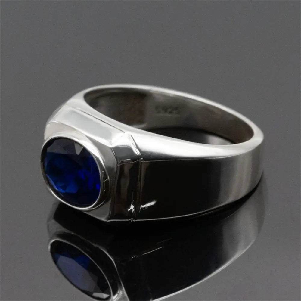 ANEL MASCULINO EM PRATA ESTERLINA 925 COM PEDRA AZUL ZIRCÔNIA