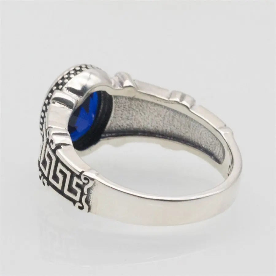 ANEL MASCULINO COM PEDRA DE ZIRCÔNIA CÚBICA AZUL EM PRATA ESTERLINA