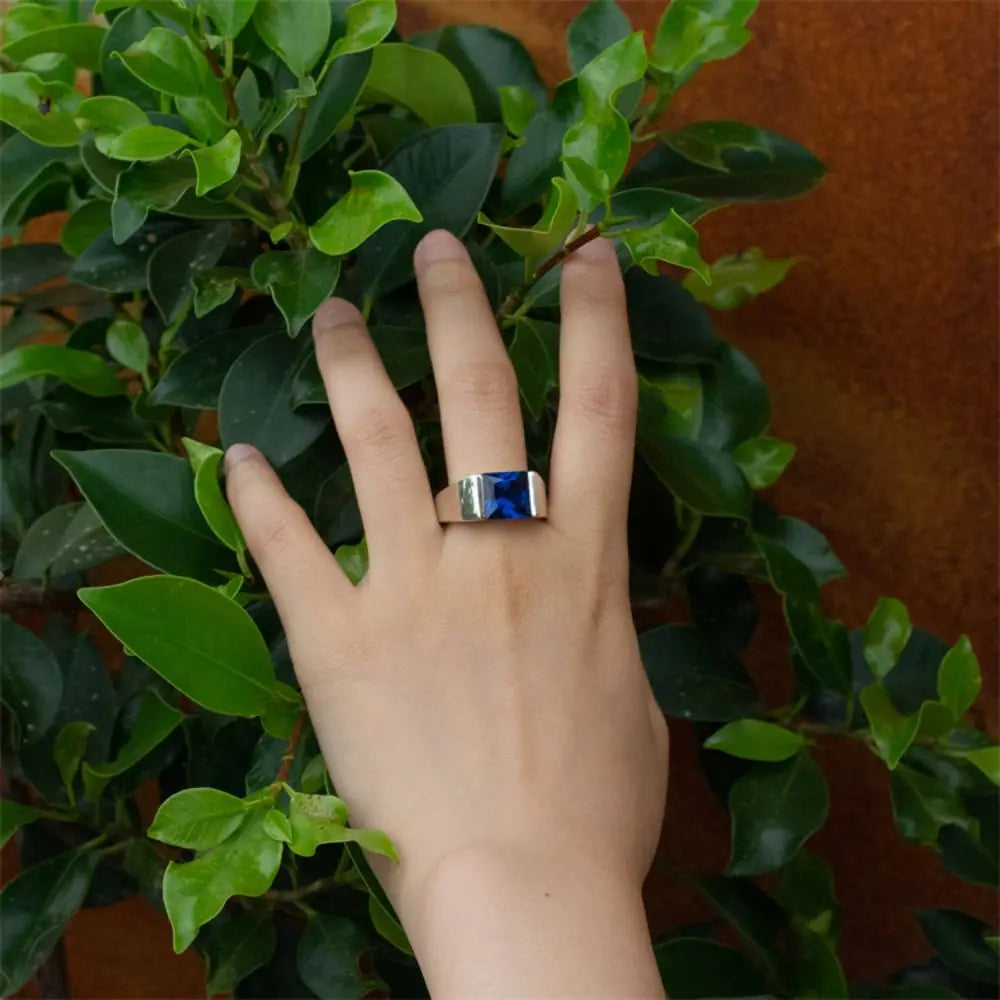 ANEL EM PRATA ESTERLINA 925 COM PEDRA AZUL NATURAL ZIRCÃO