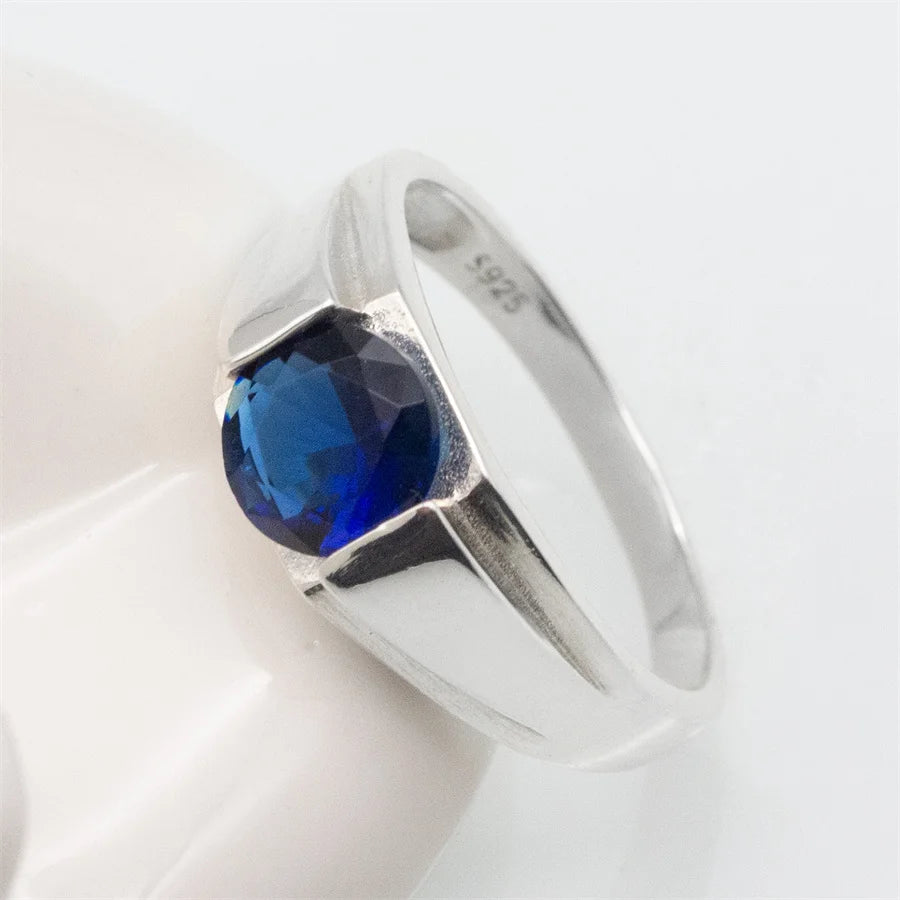 ANEL MASCULINO COM PEDRA DE ZIRCÔNIA AZUL EM PRATA ESTERLINA